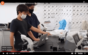 a YouTube clip of students in the biology lab performing an experiment