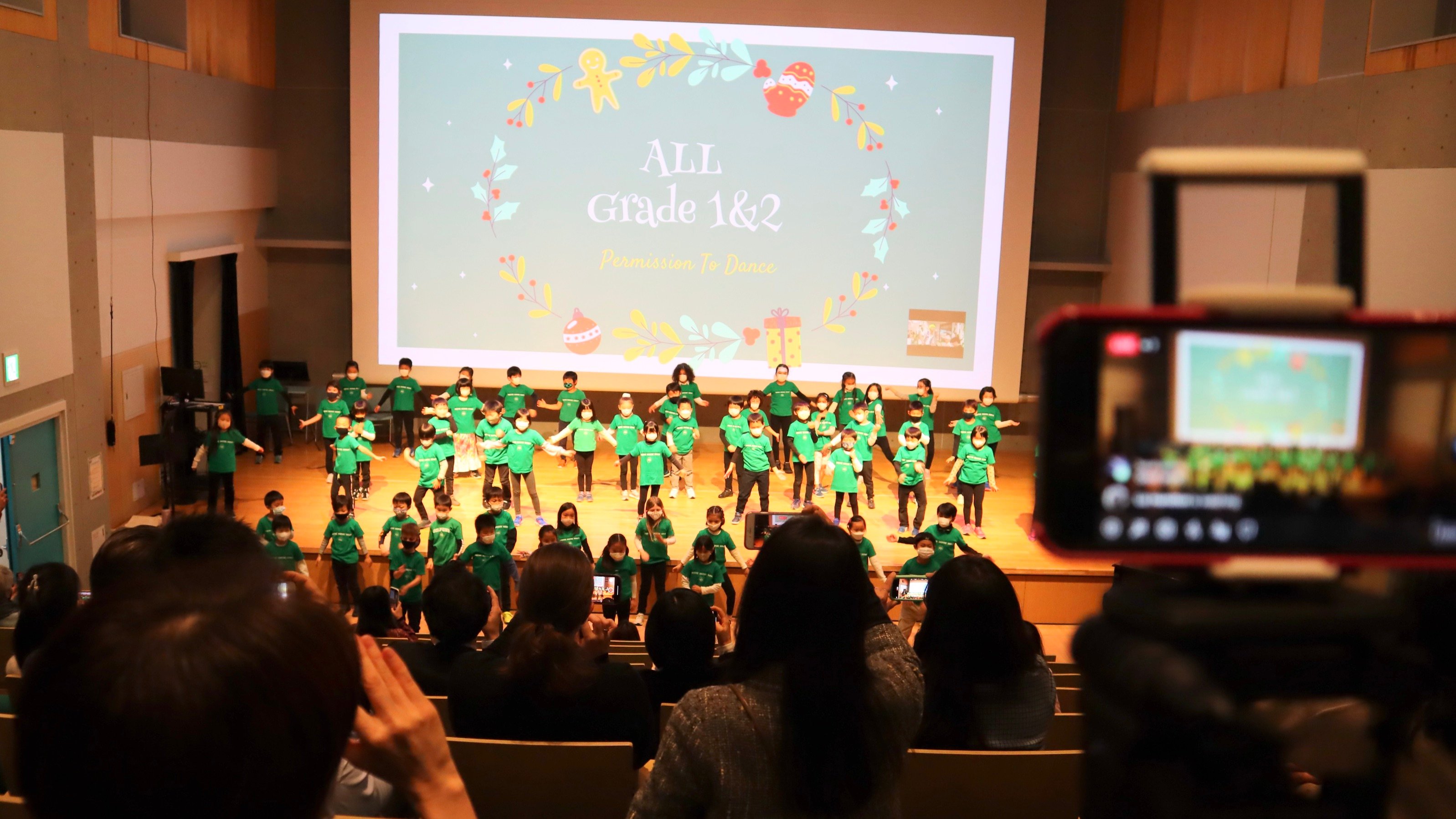 Students performing on the stage for the Primary School Assembly