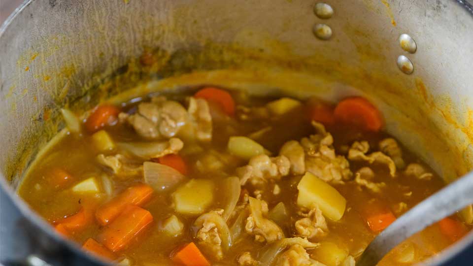 nis student cook dinner during student retreats
