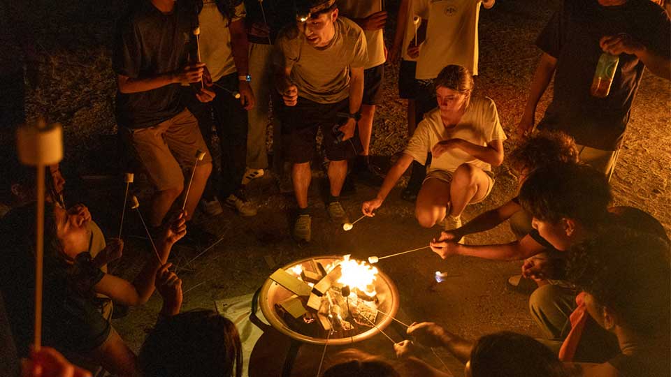 making a campfire on nis student retreats