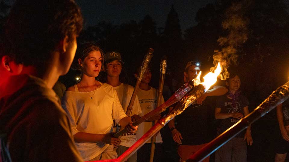 making a campfire on nis student retreats